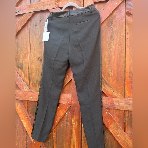 A black pair of tuxedo pants in size 6 with tags. - Picture 2 of 4